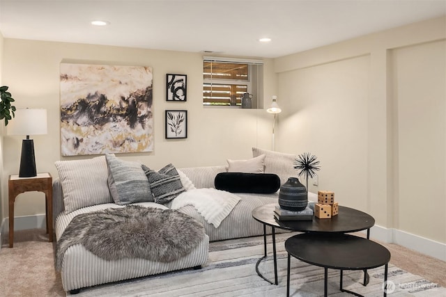 living room with recessed lighting, baseboards, and carpet floors