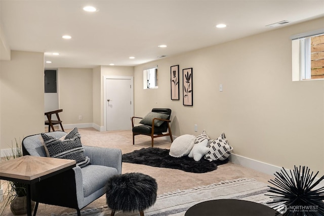 interior space with visible vents, carpet floors, baseboards, electric panel, and recessed lighting