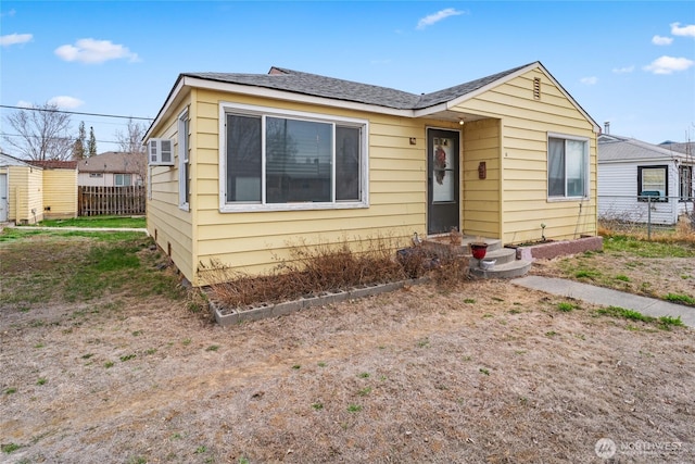 view of front of property with fence