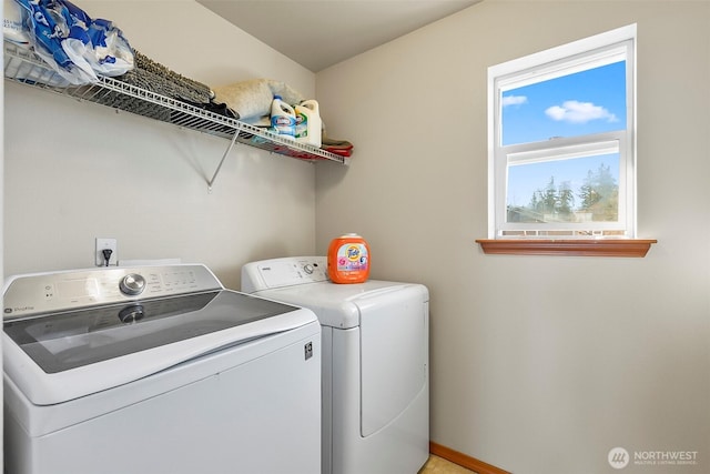 washroom with laundry area and washing machine and clothes dryer