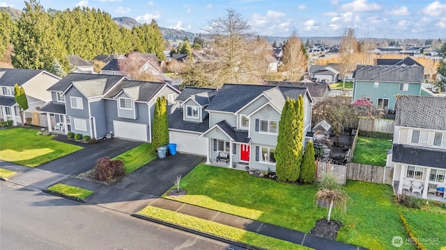 drone / aerial view with a residential view