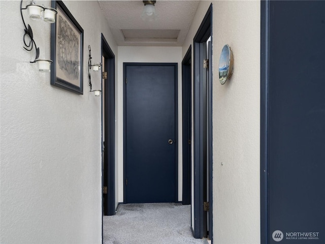 corridor featuring attic access