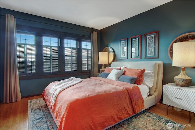 bedroom featuring wood finished floors