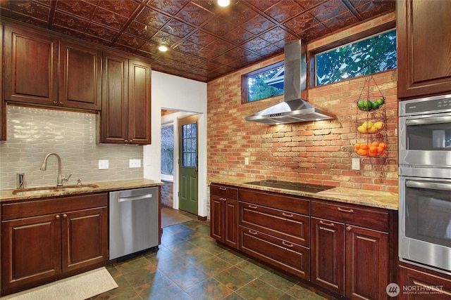 kitchen featuring stainless steel appliances, a sink, ventilation hood, tasteful backsplash, and an ornate ceiling