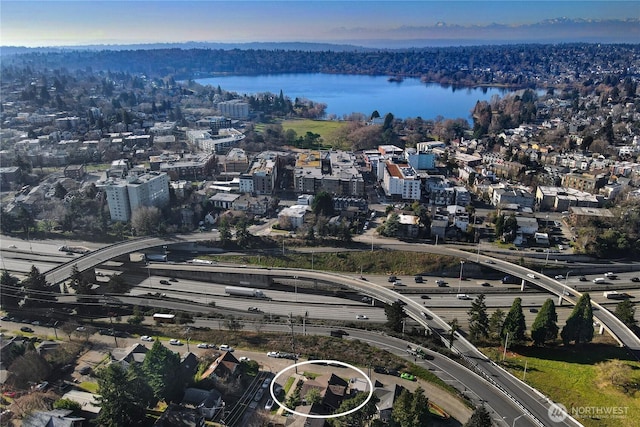 aerial view featuring a water view and a city view