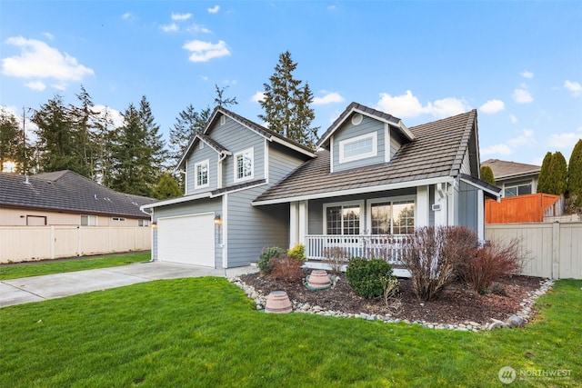 view of front of home with a porch, concrete driveway, an attached garage, a front yard, and fence