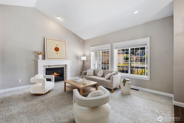 9100 Lewis Dr NE, Lacey, WA 98516 - carpeted living area with lofted ceiling and a tile fireplace