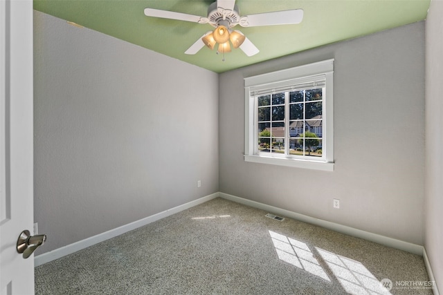 9100 Lewis Dr NE, Lacey, WA 98516 - carpeted spare room featuring baseboards and a ceiling fan
