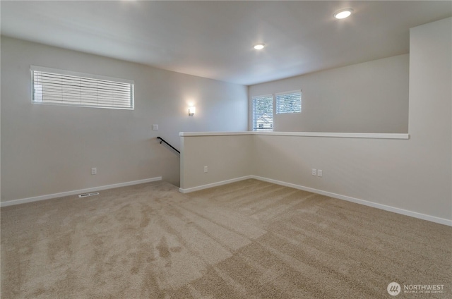3467 183rd Street Ct E, Tacoma, WA 98446 - unfurnished room with light carpet, visible vents, baseboards, and recessed lighting