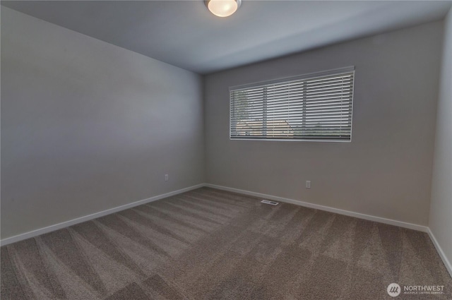 3467 183rd Street Ct E, Tacoma, WA 98446 - spare room featuring visible vents, baseboards, and carpet flooring