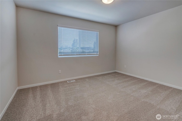 3467 183rd Street Ct E, Tacoma, WA 98446 - unfurnished room with baseboards, visible vents, and light colored carpet