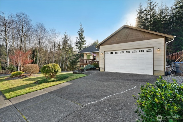 view of front of home featuring driveway and an attached garage