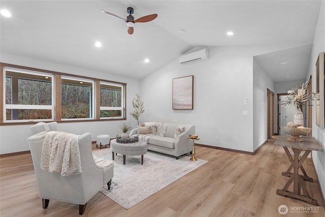 living room with lofted ceiling, light wood-style flooring, ceiling fan, a wall mounted air conditioner, and baseboards