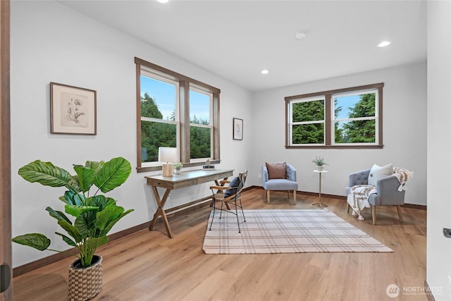 home office featuring light wood-style floors, baseboards, and recessed lighting