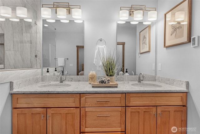 full bath featuring a sink and double vanity