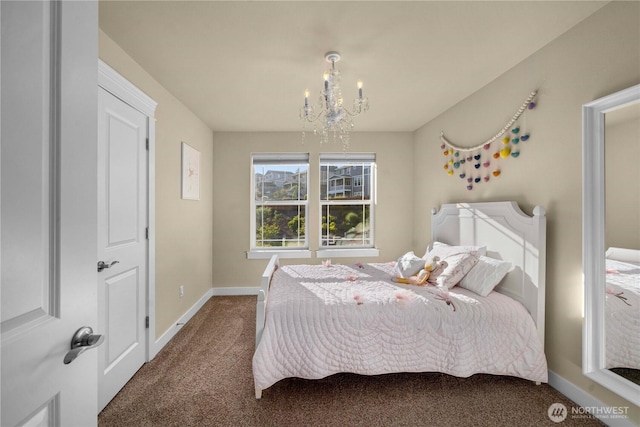 bedroom with carpet floors, baseboards, and an inviting chandelier