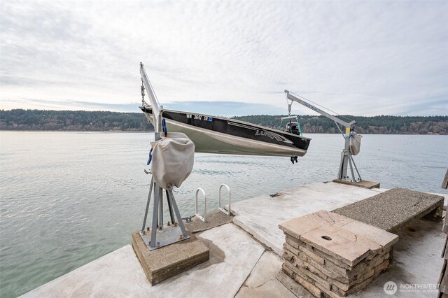 view of dock with a water view