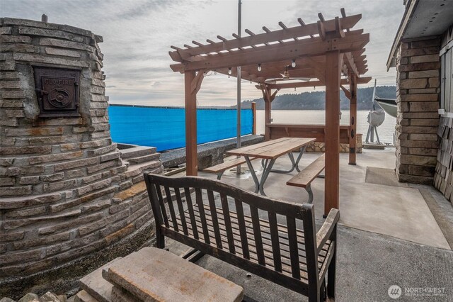 view of patio / terrace featuring a pergola