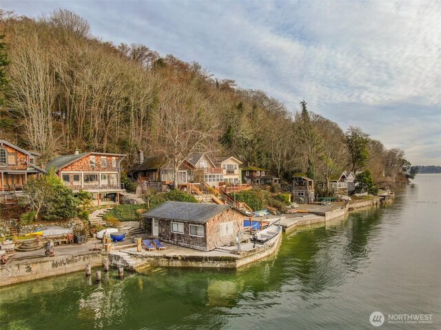 view of dock with a water view