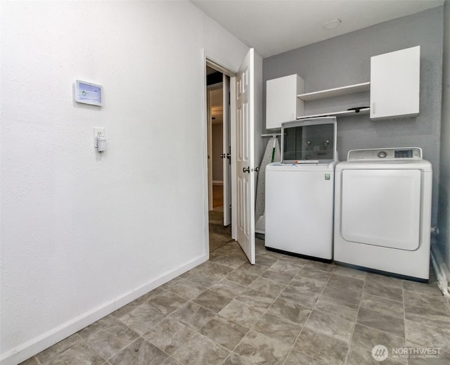 17123 6th Avenue Ct E, Spanaway, WA 98387 - laundry area with separate washer and dryer and baseboards