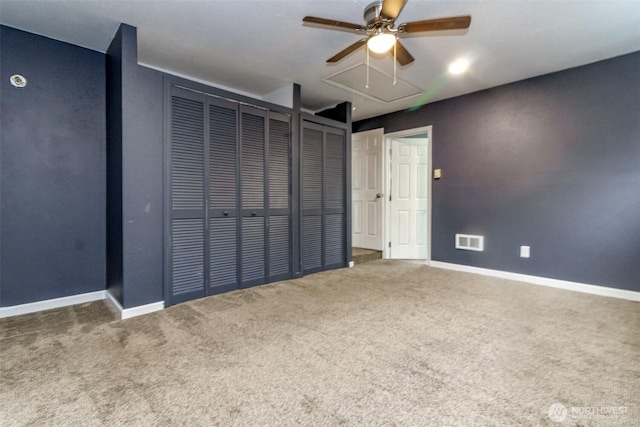17123 6th Avenue Ct E, Spanaway, WA 98387 - unfurnished bedroom featuring attic access, carpet flooring, baseboards, and two closets