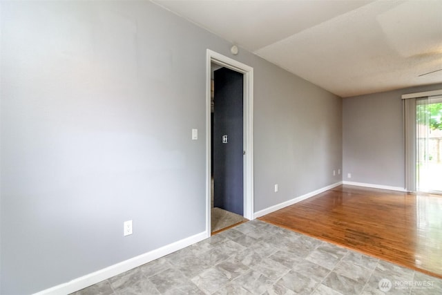 17123 6th Avenue Ct E, Spanaway, WA 98387 - unfurnished room featuring baseboards and light wood-style floors