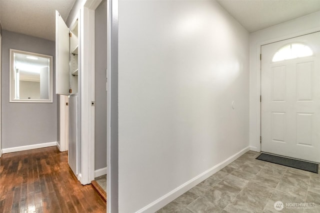 17123 6th Avenue Ct E, Spanaway, WA 98387 - foyer entrance featuring baseboards