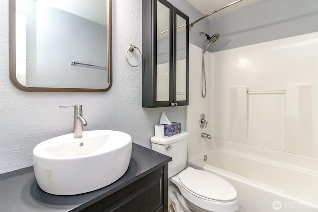 17123 6th Avenue Ct E, Spanaway, WA 98387 - full bath featuring a textured wall, shower / tub combination, toilet, and vanity