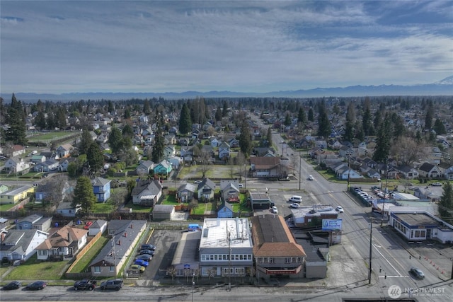 bird's eye view with a residential view and a mountain view