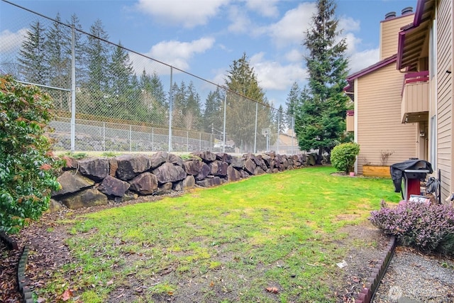 view of yard with fence