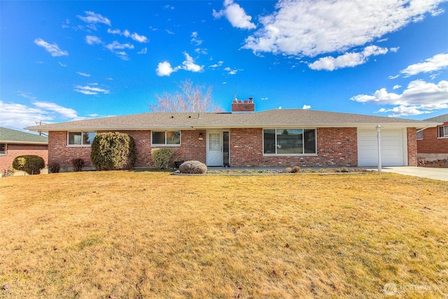 ranch-style home featuring a garage, brick siding, a chimney, and a front lawn