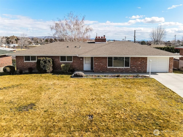 ranch-style home featuring brick siding, driveway, a front lawn, and roof with shingles