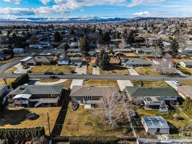 bird's eye view with a residential view and a mountain view