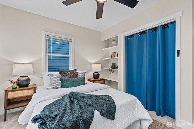 bedroom with light colored carpet and ceiling fan