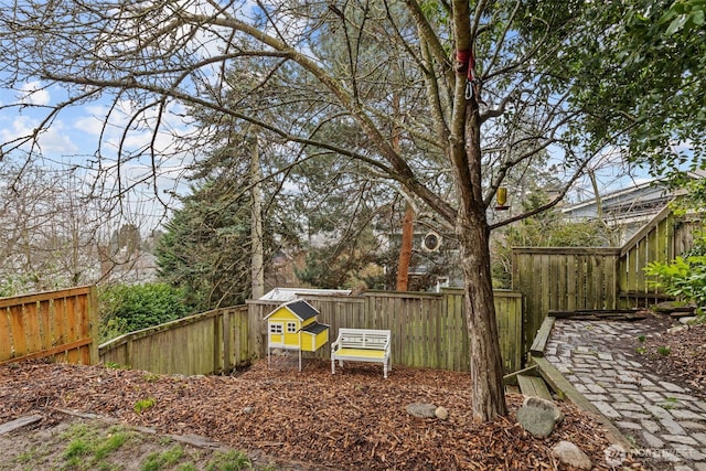 view of yard with a fenced backyard