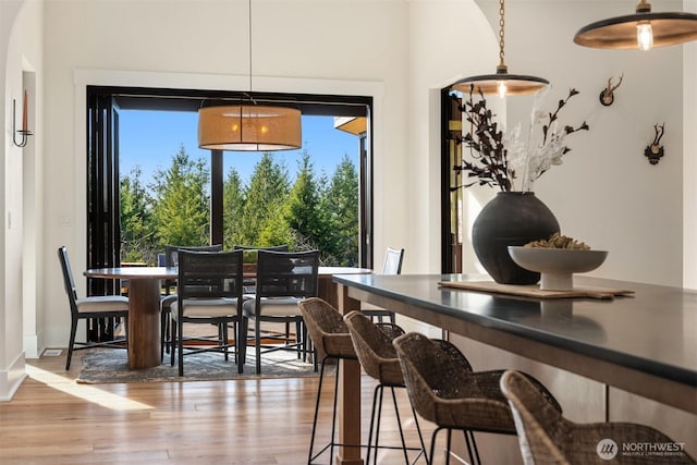 dining area with light wood-type flooring