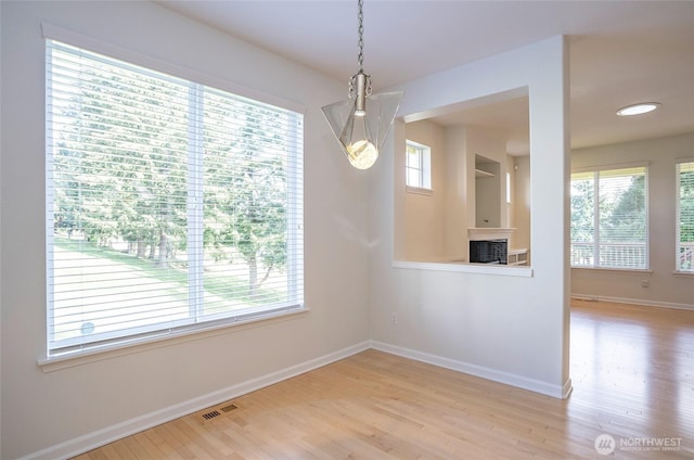 4329 Fairwood Blvd NE, Tacoma, WA 98422 - spare room with visible vents, a healthy amount of sunlight, light wood-type flooring, and baseboards