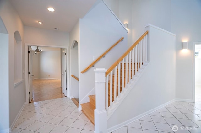 4329 Fairwood Blvd NE, Tacoma, WA 98422 - staircase featuring arched walkways, tile patterned flooring, recessed lighting, and ceiling fan