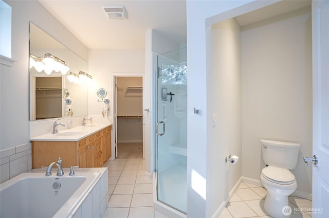4329 Fairwood Blvd NE, Tacoma, WA 98422 - bathroom with a sink, toilet, a stall shower, and tile patterned floors