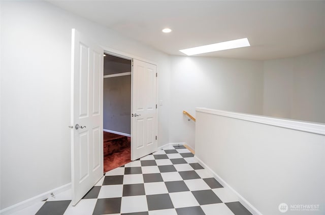 4329 Fairwood Blvd NE, Tacoma, WA 98422 - corridor featuring tile patterned floors, baseboards, a skylight, and recessed lighting