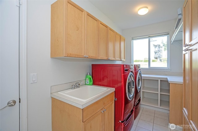 4329 Fairwood Blvd NE, Tacoma, WA 98422 - washroom featuring a sink, light tile patterned flooring, cabinet space, and washer and clothes dryer