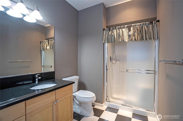 4329 Fairwood Blvd NE, Tacoma, WA 98422 - full bathroom featuring tile patterned floors, toilet, and a stall shower