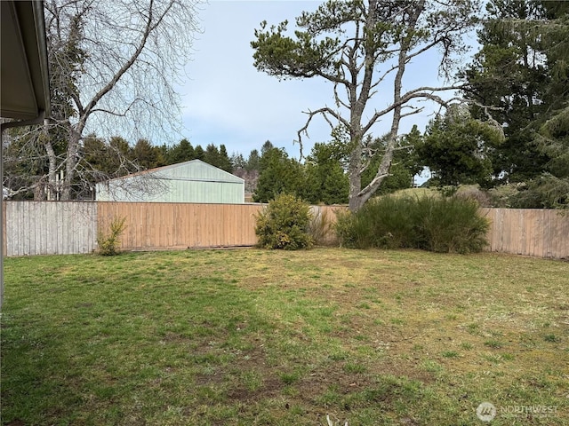 view of yard featuring a fenced backyard