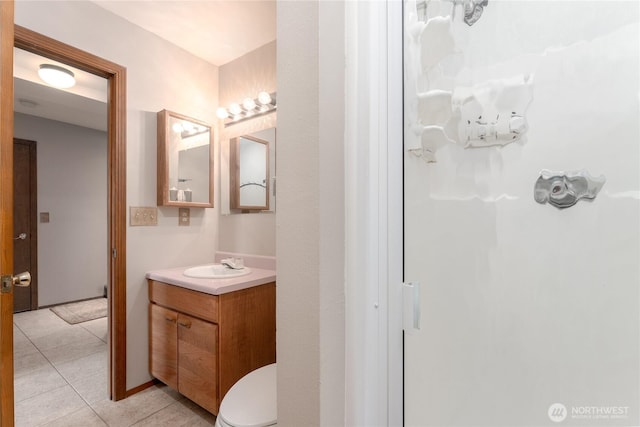 bathroom with vanity and tile patterned floors