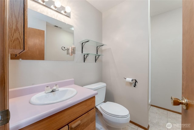 bathroom featuring visible vents, tile patterned flooring, vanity, and toilet