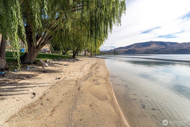 view of street with a water and mountain view