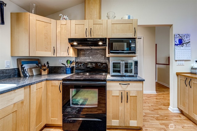 kitchen featuring range hood, light wood finished floors, dark countertops, light brown cabinets, and black appliances