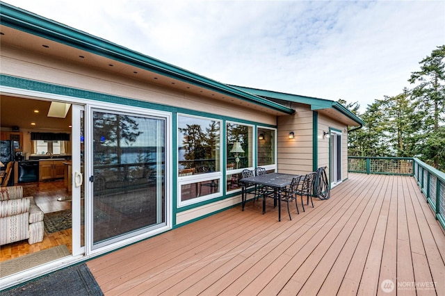 deck with outdoor dining space