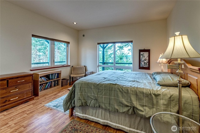 bedroom featuring light wood-style floors and recessed lighting