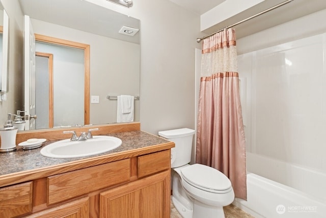 bathroom featuring toilet, shower / bath combination with curtain, and vanity